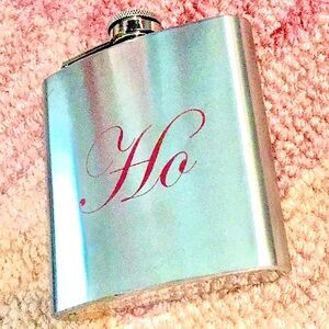 Stainless Steel Flask with “Ho” inscripted. Perfect for the Holidays!